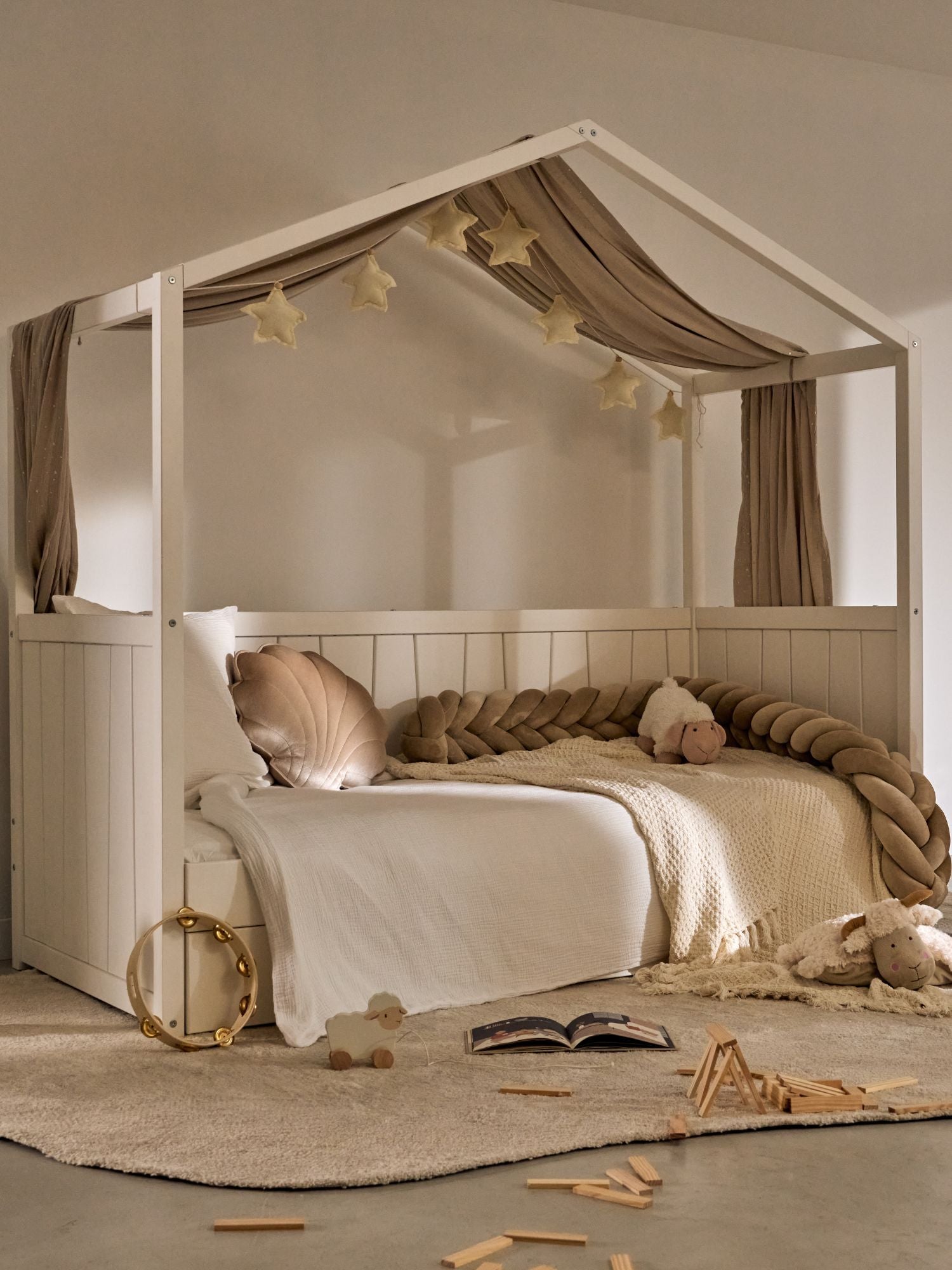 Calvi white wooden trundle bed with storage drawers for children's bedroom.