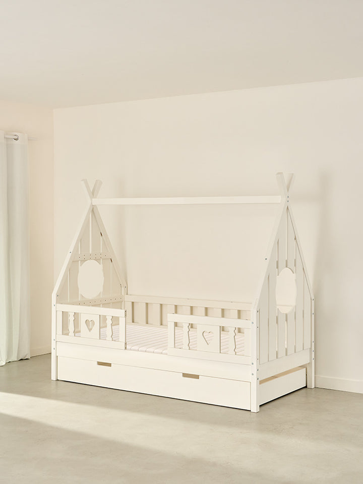 Lit cabane enfant Dakota blanc en bois, 2 barrières cœur et tiroir de rangement, pour chambre.