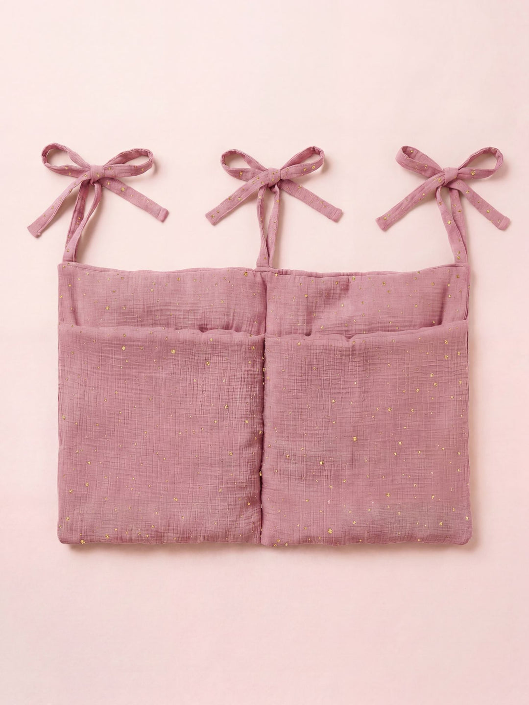 Pochette de rangement Cabania rose à pois dorés, organiseur maquillage/accessoires de voyage élégant et pratique.