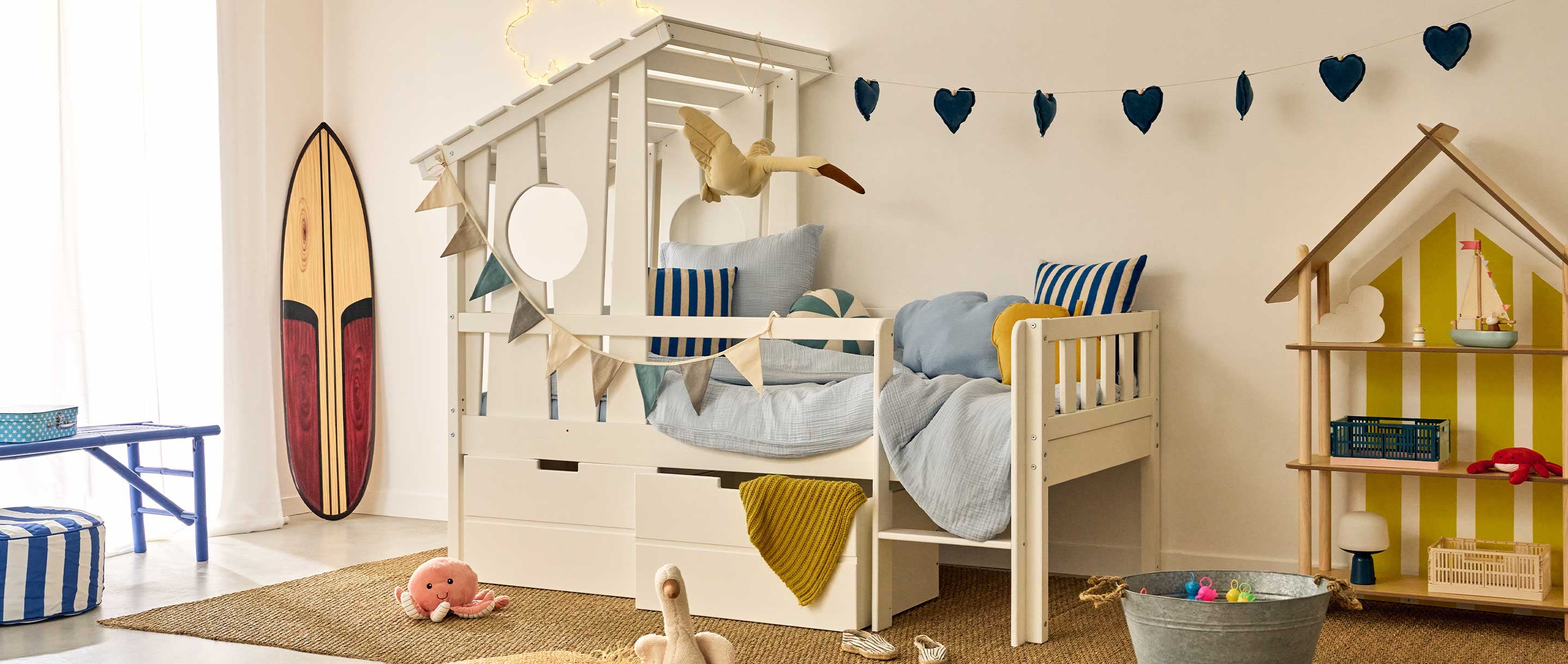 Oleron white cabane children's bed with safety rails, modern Scandinavian design for a mixed children's bedroom.