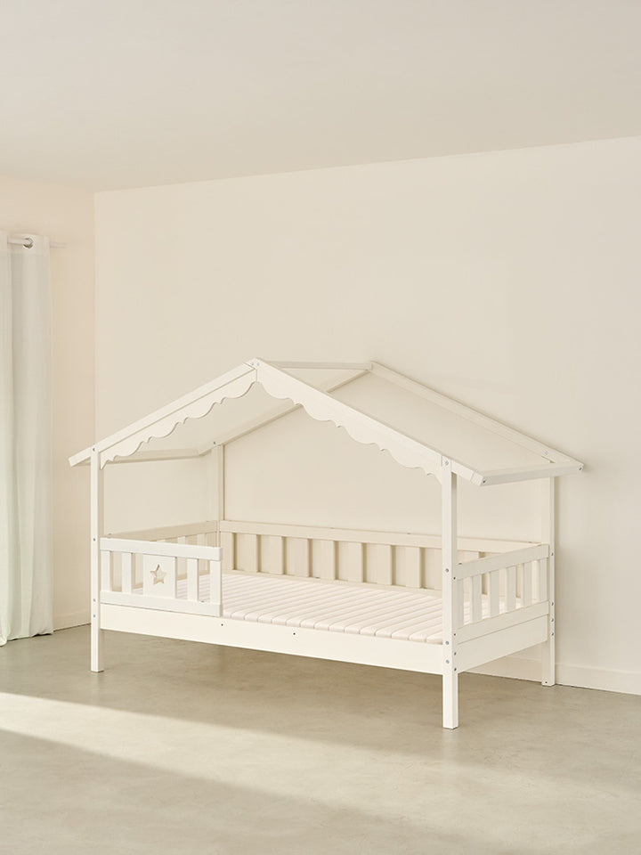 Chamonix white wooden children's cabin bed with star gate, ideal for a playful bedroom.