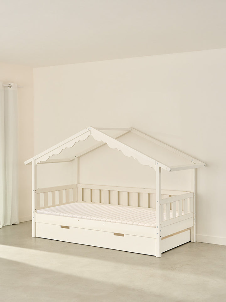 Chamonix white solid wood children's cabin bed with integrated storage drawer.