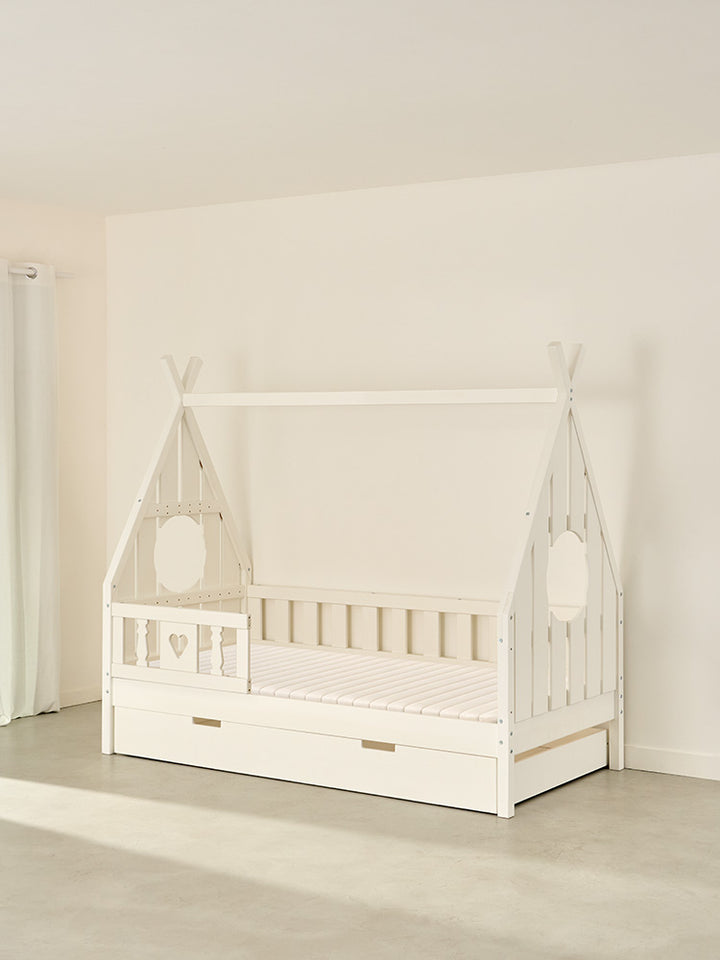 White Dakota children's cabin bed with heart-shaped barrier and storage drawer, in natural solid wood.