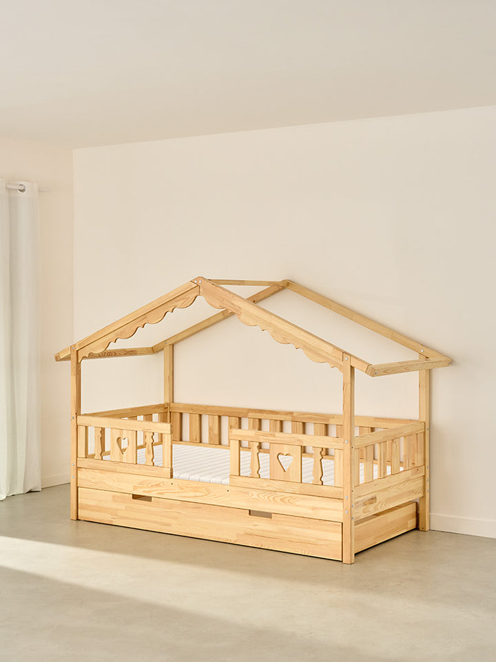CHAMONIX children's cabin bed in natural wood with 2 heart-shaped rails and storage drawer, ideal for a girl's bedroom.