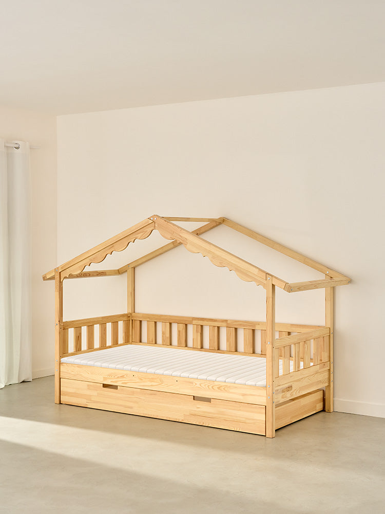 CHAMONIX children's cabin bed in natural wood with storage drawer, ideal for a child's bedroom.