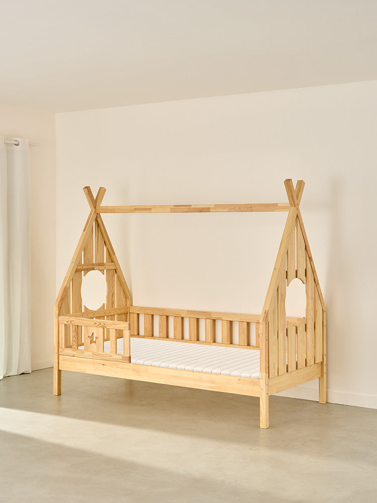 Dakota children's cabin bed in natural wood with star gates, ideal for bedroom and play area.