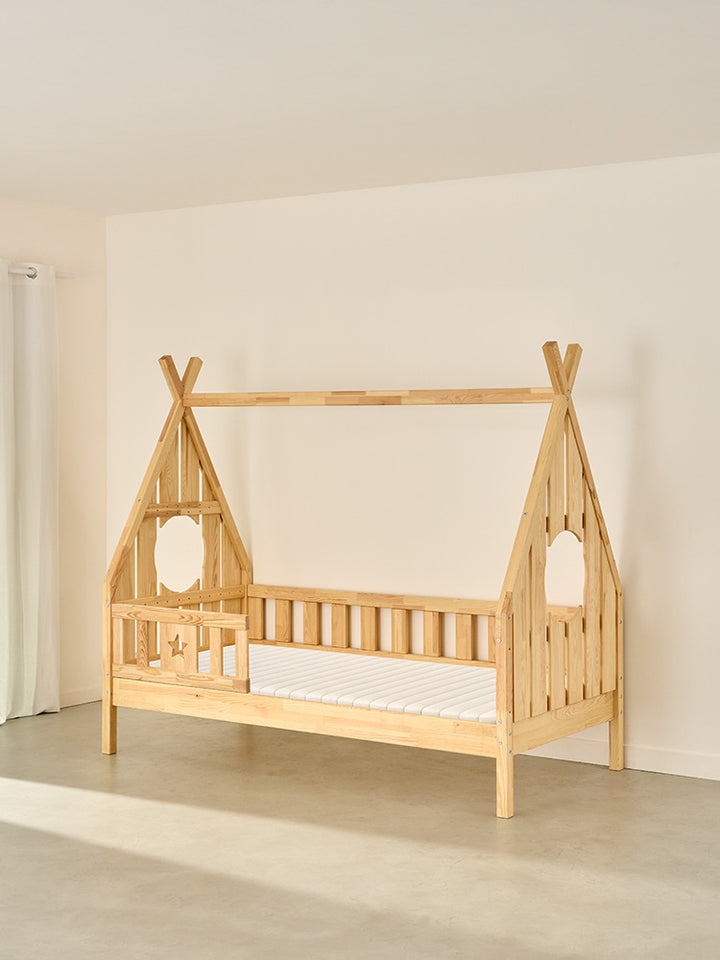 Dakota children's cabin bed in natural wood with star gates, ideal for bedroom and play area.