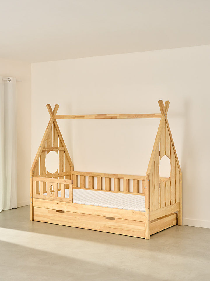 DAKOTA children's cabin bed in natural wood, with fir fence and drawer, for bedroom.