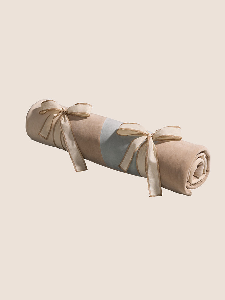 Cabania velvet rug for children's bedrooms, wavy sea green pattern, rolled up